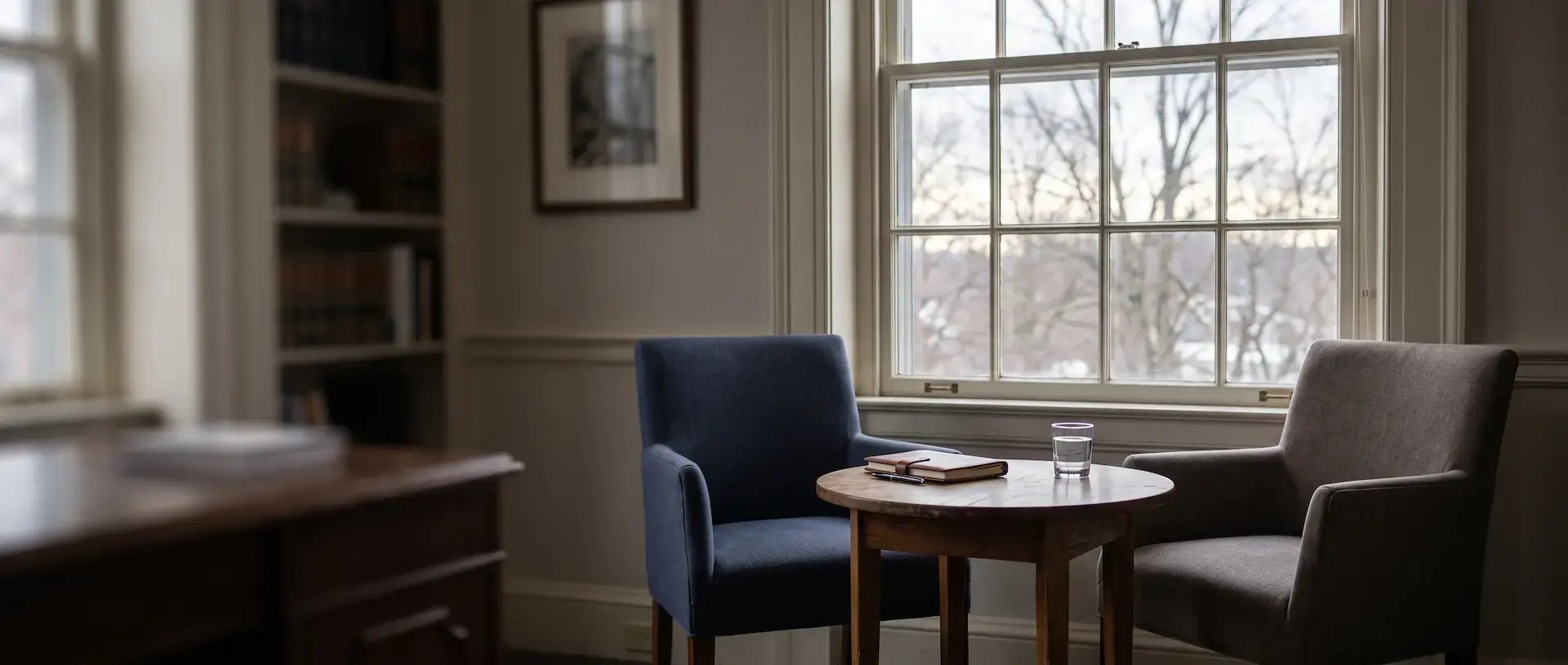 Two chairs at a table in a Connecticut law office ready for a trust litigation lawyer consultation