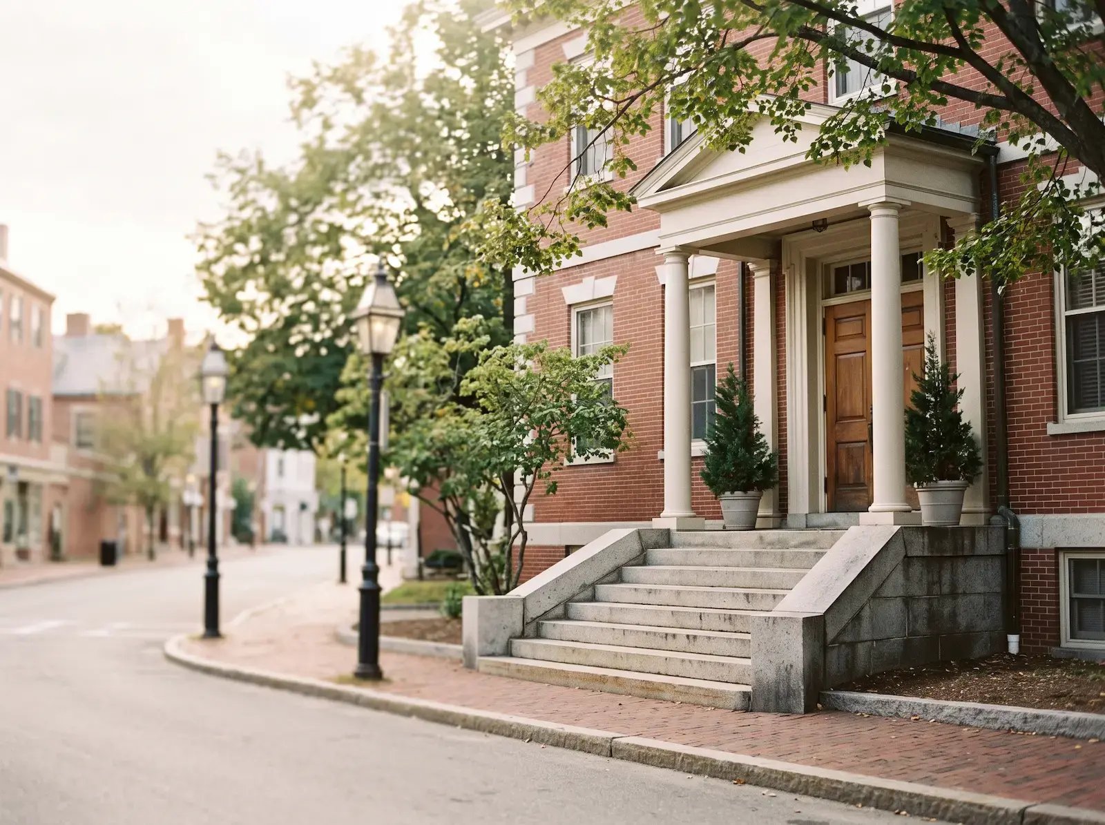 The entrance steps of a small New England courthouse.